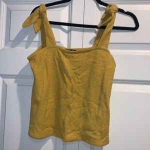 Mustard yellow tie (at the shoulders) tank top. Express